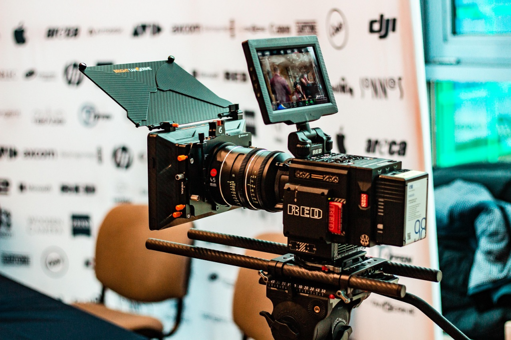 Marlee Matlin's documentary highlights her life, career, resilience, and advocacy. A video camera sits on a tripod recording an interview.